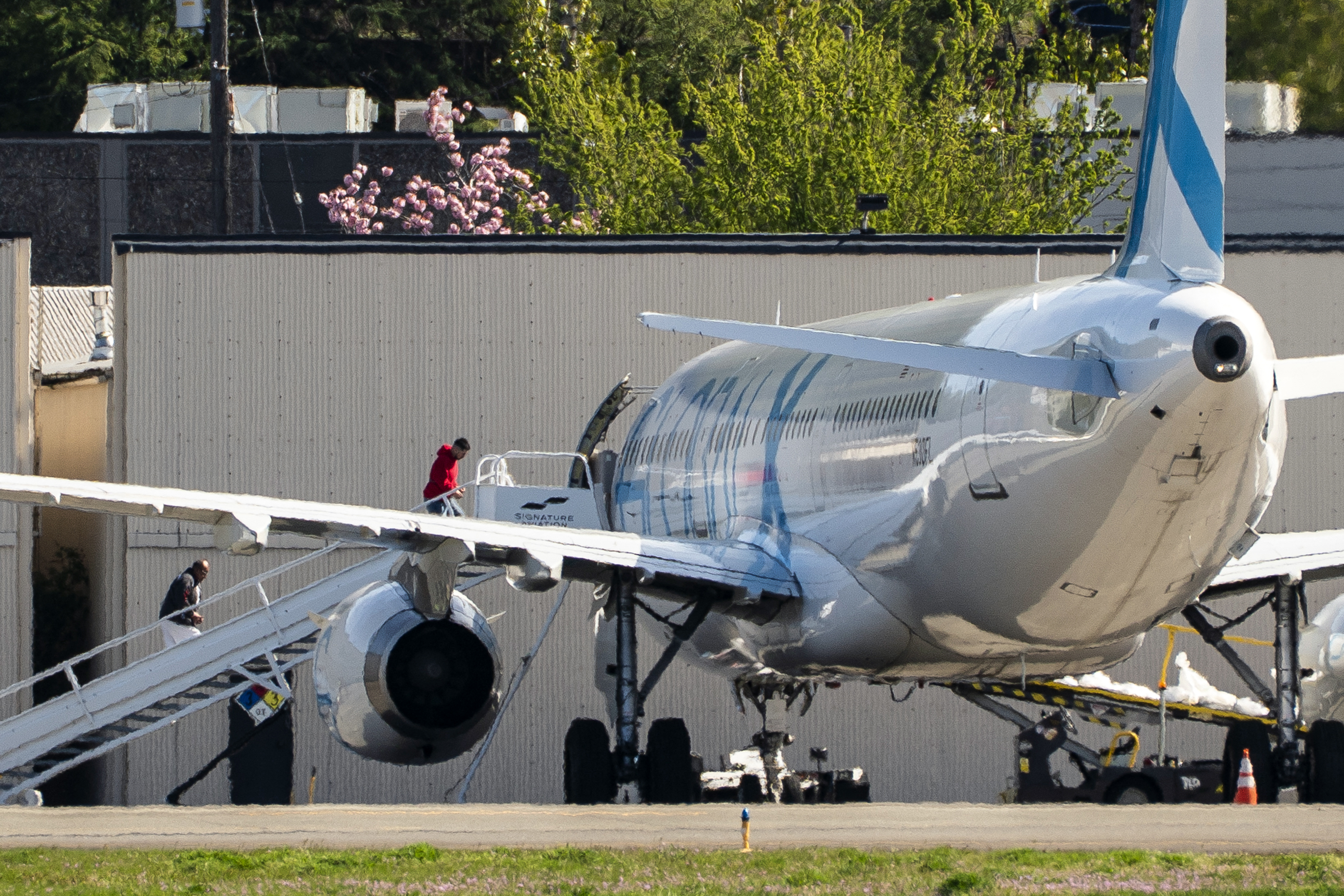 Migrantes deportados en el aeropuerto de Seattle.